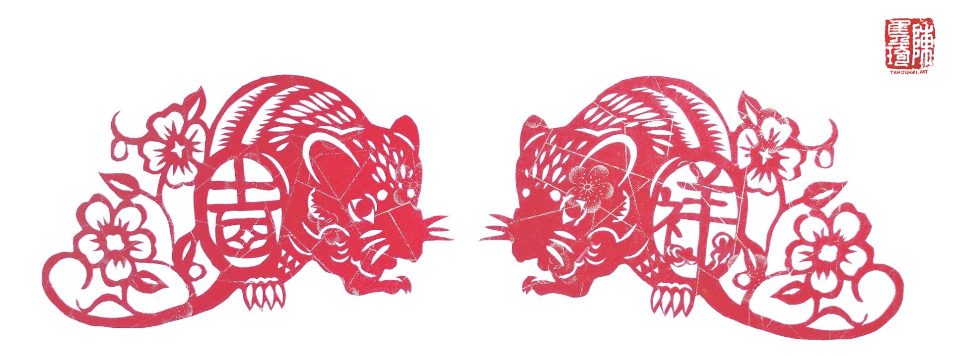 Two mirror-image chinese papercuts of rats crouching and nibbling on food. Decorative flowers and the chinese words for lucky and auspicious adorn their legs and tail.