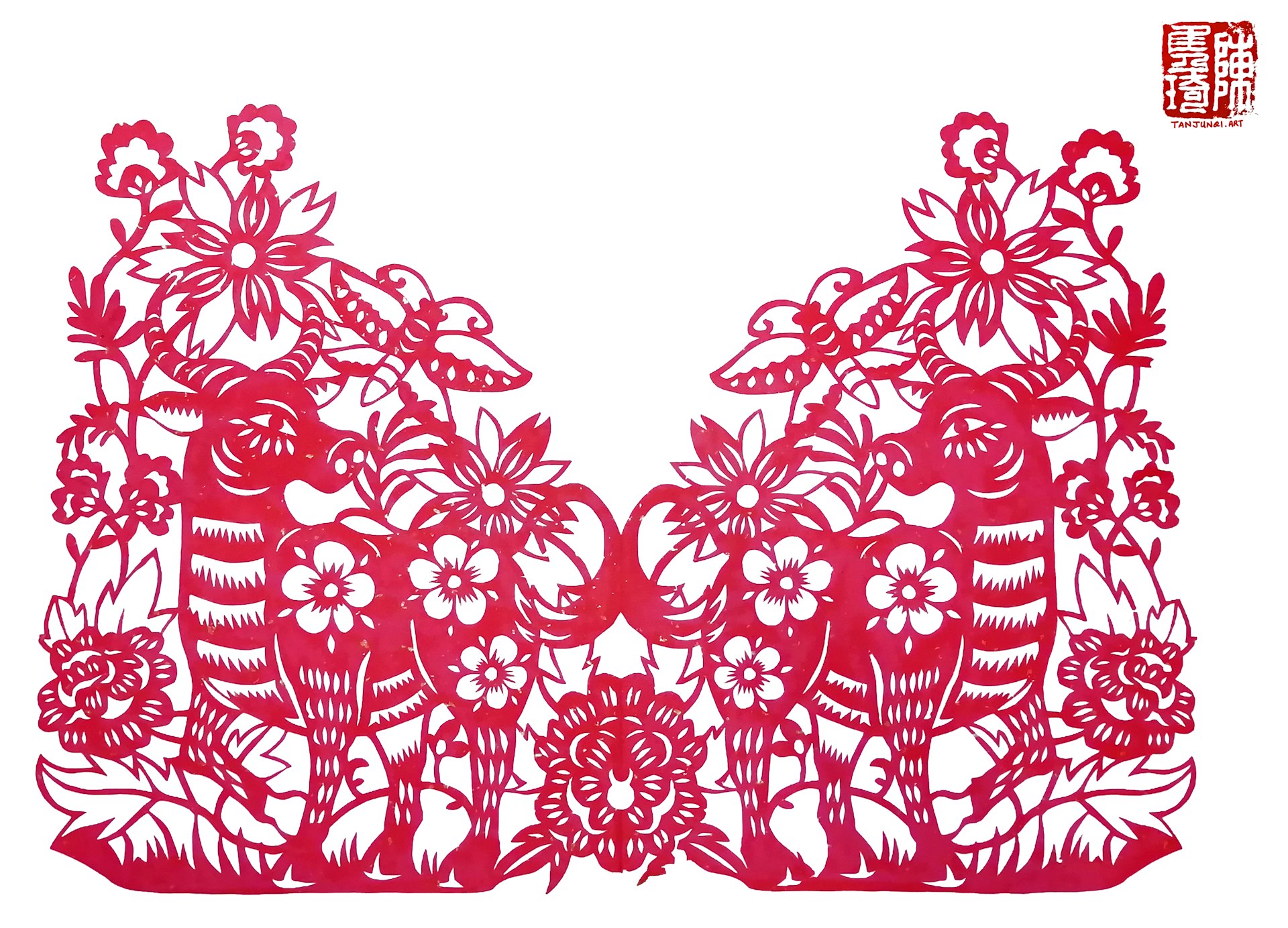 对称的剪纸，描绘的是两头站在盛开的花丛中的牛，望着空中飞舞的蝴蝶