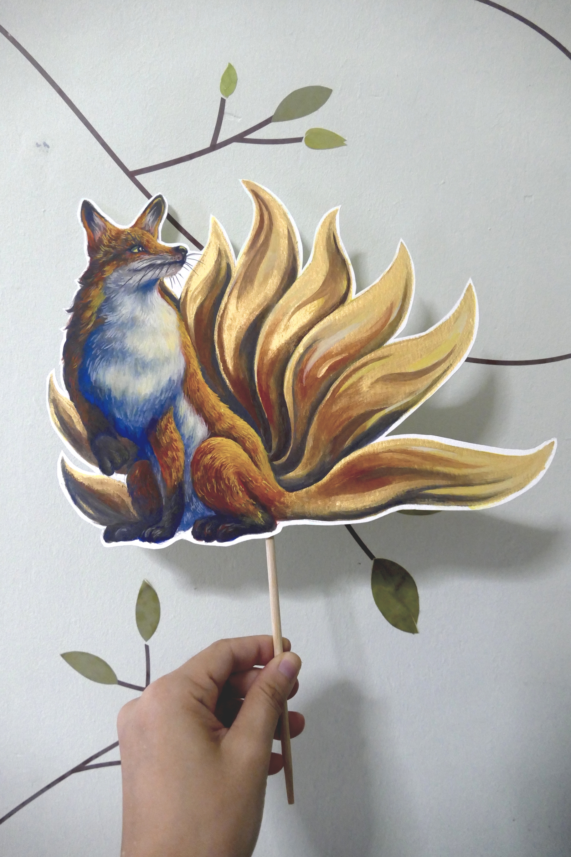 Another photo of the same prop at a different angle to show the shimmers of the gold paint